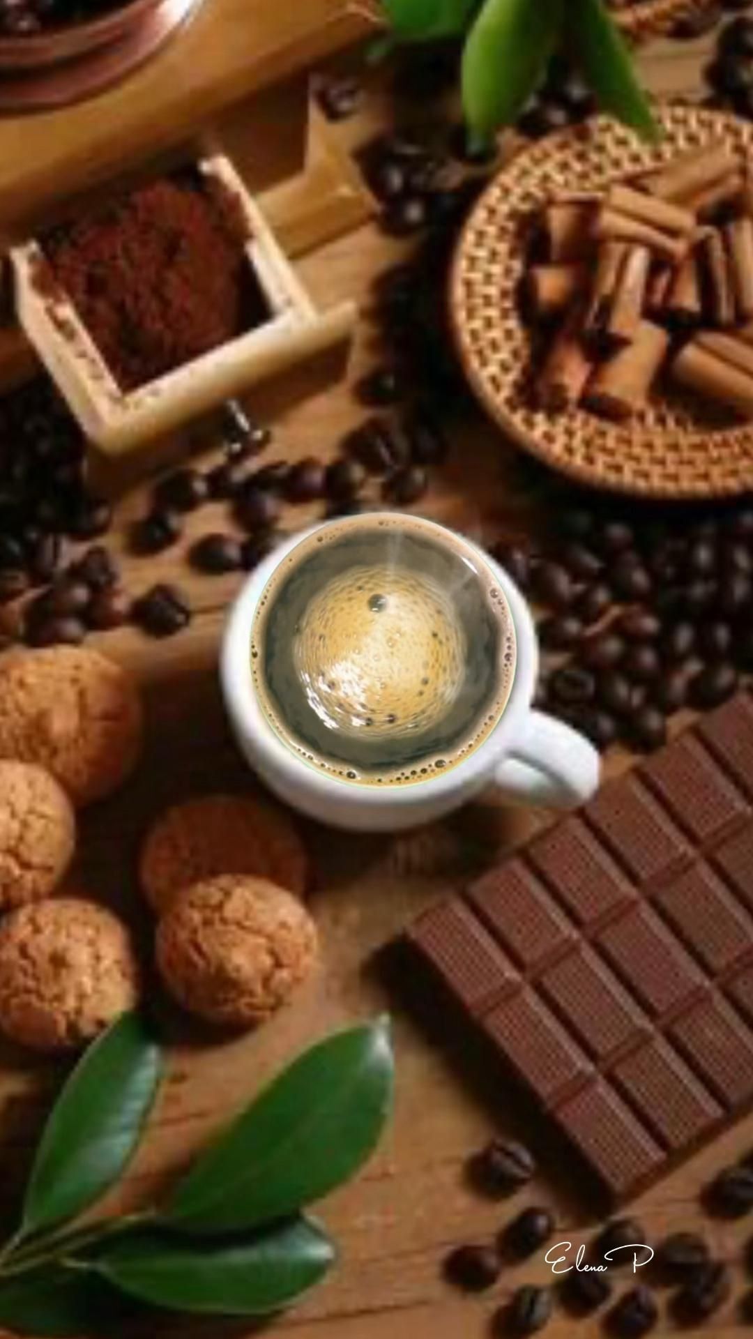 Открытка с добрым утром. Доброе утро a cup of coffee sitting on top of a wooden table next to chocolate and nuts